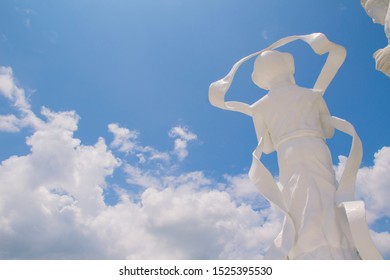 The marble Guan Yin hold vase and tree in her hand, in Songkhla, Thailand on Sep 27,2019. - Shutterstock ID 1525395530