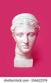 Marble Head Of Young Woman, Ancient Greek Goddess Bust Isolated On Pink Background