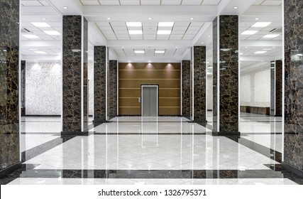 Marble Interior Of Luxury Lobby Of Commercial Building Or Hotel. Clean Corporate Hall With Real Floor Tile. Shiny Floor With Reflections In Modern Office After Professional Cleaning Service.