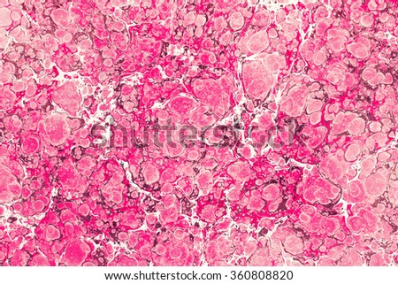 Marble paper pattern abstract design in shades of pink and red in vintage style for decorative designs