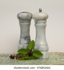 Marble Pattern Salt Shaker And Pepper Grinder. 