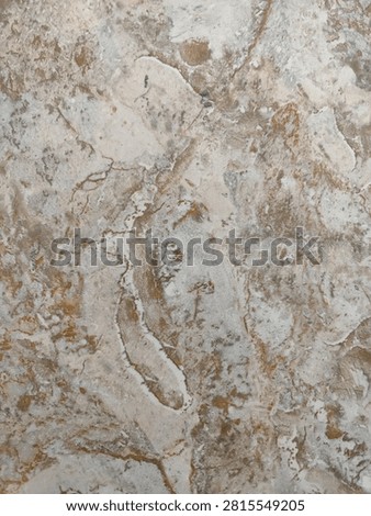 Marble patterned ceramic surface with cream, white and light brown nuances with natural texture