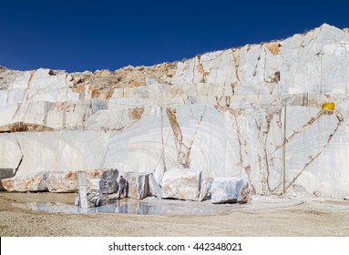 Marble quarry site in Turkey. Diamond wire saw for marble quarry. Mostly used for cutting granite and marble blocks. At the moment of big marble block cutting, it is cooled with water. - Powered by Shutterstock