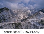 Marble quarry top view. Winding road to the marble quarry. Aerial panorama of marble quarries Carrara Italy. Aerial panorama on the Carrara marble quarry.