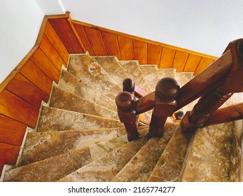 Marble Staircase In The Hotel. Many Steep Steps, A Sharp Turn On The Stairs Down. Natural Stone On The Stairs, Expensive Material, Smooth Texture.