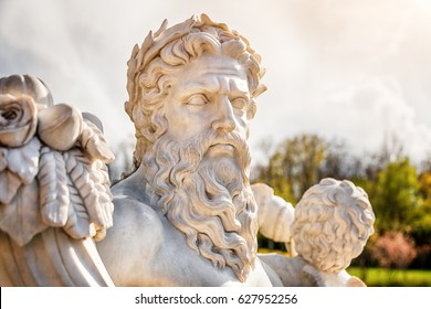 Marble Statue Of Greek God With Cornucopia In His Hands.