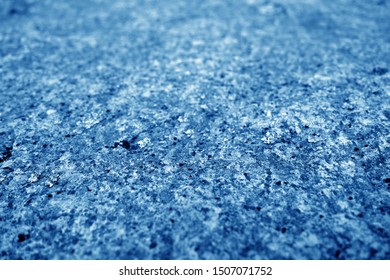 Marble stone background with blur effect in navy blue tone. Abstract architectural background and texture for design.