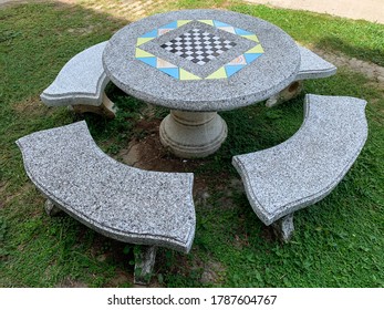 Marble stone table and bench with Checkerboard for player.Chess table