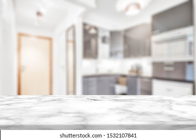Marble stone table top (kitchen island) on blur kitchen interior background - can be used for display or montage you products - Shutterstock ID 1532107841