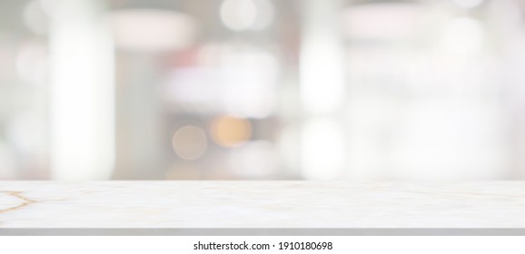 marble table top with blurred abstract cafe restaurant interior background - Shutterstock ID 1910180698