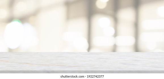 Marble Table Top With Blurred Abstract Cafe Restaurant Interior Background