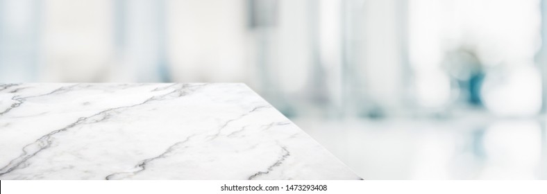 marble table top product display background with blur business office hallway.left perspective stone kitchen counter with people waiting doctor in hallway.Banner mockup presentation - Shutterstock ID 1473293408