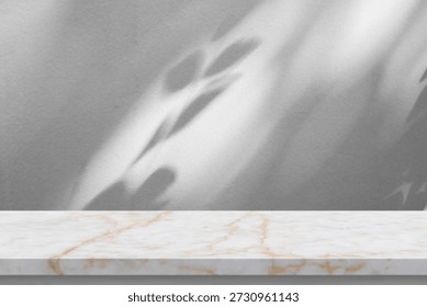 Marble table with tree shadow drop on white wall background for mockup product display