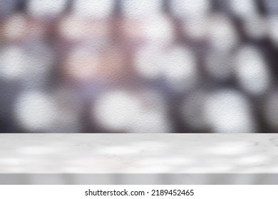 Marble Table With White Stucco Wall Texture Background With Light Beam, Bokeh And Shadow, Suitable For Product Presentation Backdrop, Display, And Mock Up.