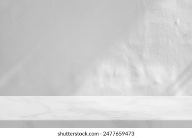 Marble Table with White Stucco Wall Texture Background with Light Beam and Shadow, Suitable for Product Presentation Backdrop, Display, and Mock up.