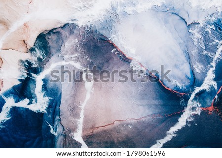 Marble texture. Acrylic ink water. Blue ocean waves sand land abstract design with white clouds effect. Natural mineral stone grain streak pattern with orange fleck veins. Luxury art background.