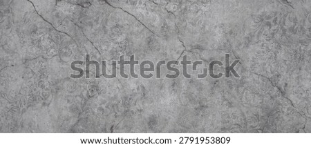 Marble texture background in soft grey with red cracks and embossed baroque floral ornamental pattern