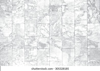 Marble Tiles On Brick Floor Or Wall Background With Grey And White Colors, Front Or Top View.