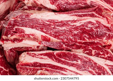 Marbled beef steaks as a background close-up. Cooking. Fresh meat. - Shutterstock ID 2307544795