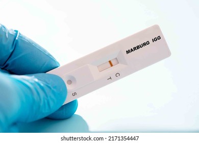 Marburg  Igg  Rapid Test Cassette in doctor hand