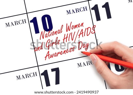March 10. Hand writing text National Women and Girls HIV AIDS Awareness Day on calendar date. Save the date. Holiday. Day of the year concept.