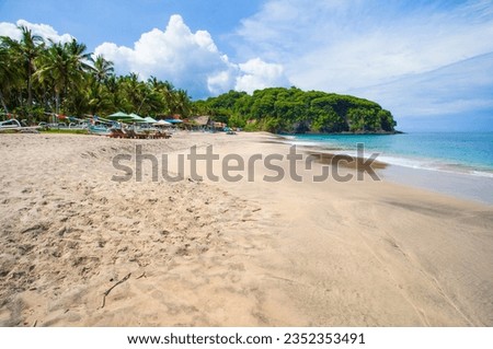 March 15, 2022 - Virgin Beach, Karangasem, Bali, Indonesia:
Virgin Beach in Bali with white sand and turquoise coloured sea.