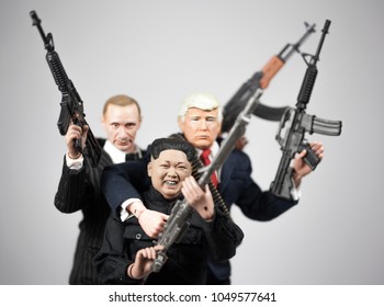 MARCH 16 2018: Caricature Of North Korean Supreme Leader Kim Jong Un, US President Donald Trump And Russian President Vladimir Putin Brandishing Firearms In A Gangster Style Pose.