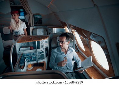 MARCH 16, 2019: Male Passenger In Business Class On Emirates- UAE Flag Carrier. 