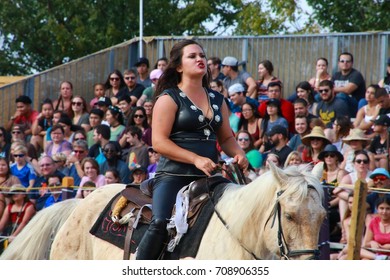 MARCH 18 2017 - RENAISSANCE FESTIVAL - DEERFIELD BEACH, FL  A Female Warrior Rides Proudly Atop Her Horse In Front Of Spectators.