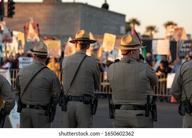 March 19th 2020 - Phoenix, Arizona - Protesters Gather In Front Of The Entrance Of The Veterans Memorial Coliseum Ahead Of Donald Trums's Rally.