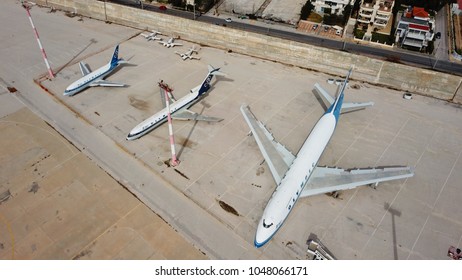 March 2015: Aerial drone photo of abandoned planes of Olympic Airways  in airport of Elliniko, Athens old airport, Attica, Greece