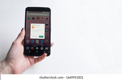 March 2020, Wales, UK. Google PlayStore Malware Play Protect Warning.
Suspicious App, Potential Harmful App Notification On An Android Device Held By A Woman