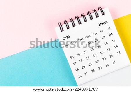 March 2023 Monthly desk calendar for 2023 year on beautiful background.