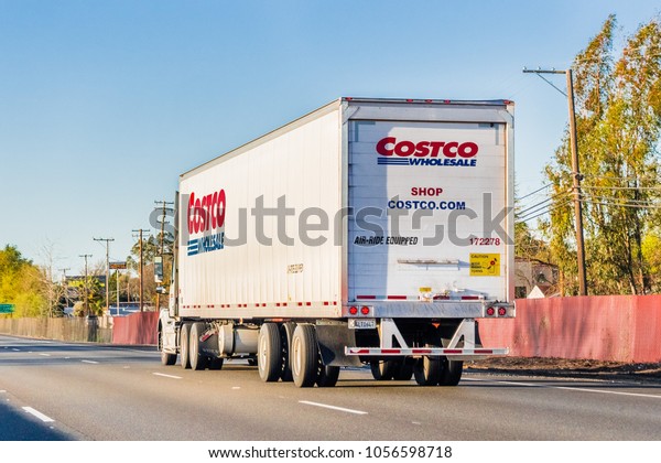 March 22, 2018 Sacramento / CA /\
USA - Branded Costco Wholesale truck driving on the\
freeway