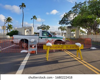 March 22, 2020, Ala Moana Beach Park, Oahu, Hawaii : Roadway Closed sign and the white truck blocked the entrance to Ala Moana beach park for protection Coronavirus spreading.