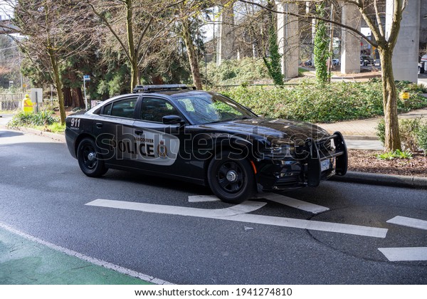 March 22,2021 Vancouver British\
Columbia Canada Police cruiser parked outside Granville\
Island