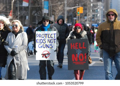 March 24 2018: MARCH FOR OUR LIVES Rally - American Gun Violence Protest - Toronto - Gun Control, Signs, Students from Stoneman Douglas High School, Parkland Florida, Politics and NRA 
