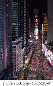 March 24th, 2018. Times Square, New York City, NY, USA- Amazing Bird's Eye View Of Times Square, New York City At Night Showing All The Car Traffic And Pedestrian Activity In The Center Of The World. 