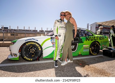 March 26, 2022 - Austin, TX, USA: A J Allmendinger And His Wife Pose For A Photo Before The Pit Boss 250 At Circuit Of The Americas In Austin, TX.