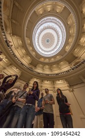 MARCH 3, 2018, TEXAS STATE CAPITOL, AUSTIN TEXAS - People Looking Up Inside The Dome Of The Texas State Capitol Building And Taking A Selfie