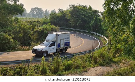 March 3 ,2022 Ratchaburi, Thailand A Van From The Sufficiency Drinking Water Company Is Taking Bottled Water Along A Curved Road To Deliver To Customers. 