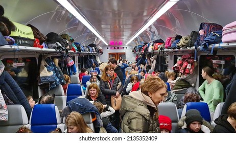 March 3, 2022 Ukraine, Lviv. Women and children are sitting in an evacuation train to go to Poland. Ukrainian refugees. War
