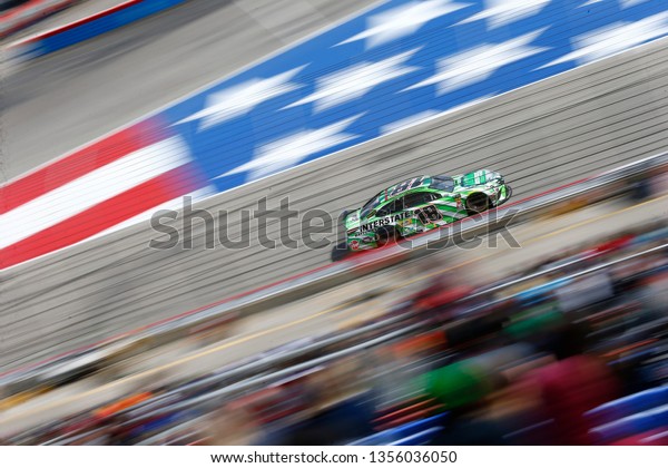 March 31, 2019 - Ft. Worth, Texas, USA:\
Kyle Busch (18) races off turn four during the O\'Reilly Auto Parts\
500 at Texas Motor Speedway in Ft. Worth,\
Texas.