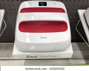March 8, 2019 - Maple Grove, MN: Cricut Easy Press 2 crafting machine on display at a retail store. This heat press tool allows the user to iron on vinyl creations to t-shirts, bags and other items