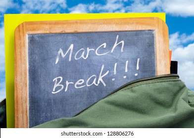 March Break Written In A Blackboard In A School Bag With Books