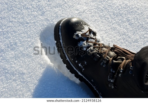 March in the cold in leather boots over the frozen\
mountains. durable full-leather mountaineering boots for the\
toughest conditions of the polar expedition. daring trekking in\
uninhabited areas