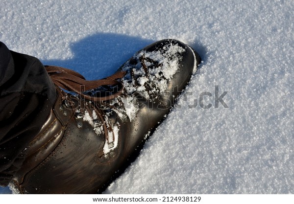 March in the cold in leather boots over the frozen\
mountains. durable full-leather mountaineering boots for the\
toughest conditions of the polar expedition. daring trekking in\
uninhabited areas