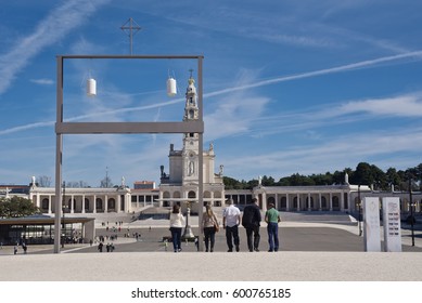 Fátima, Ourém/Portugal - March F 2017: Pilgrims Cross The Centennial Arch In The Sanctuary Of Our Lady Of Fatima, In Portugal. This Arch Grants Plenary Indulgence To Those Who Are Able To Receive It.