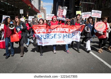 March For Our Lives: New York State Nurses Association Members Walk With Banner That Says Gun Violence Kills Nurses Heal In The March To End Gun Violence On 6th Ave, NEW YORK MAR 24 2018.