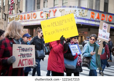 March For Our Lives: Participants In The March To End Gun Violence Hold Signs With Various Phrases Including References To Fix Or Replace The 2nd Amendment, On 6th Ave, NEW YORK MAR 24 2018.